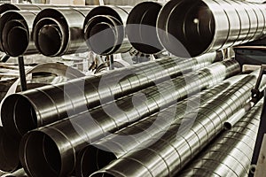 Stack of steel or metal pipes as industrial background