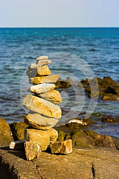 Stack stone balance with ocean skyline