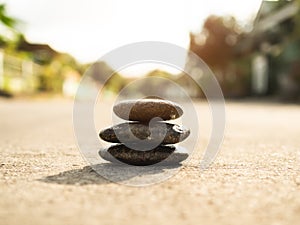 Stack Stone on Cement Floor middle Road Background Balance Pebble on Natural,Zen Garden Calm,Balance,Stability,Spiritual Symbols,