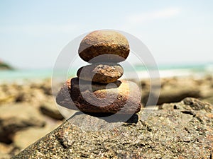 Stack Stone Pebble Zen Balance with blur Water Sea Beach Sand Calm Concept Spa Stability Spiritual,Pyramid Rock at Coast Island on