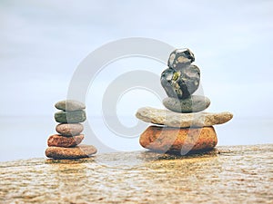 Stack of stones on beach - nature background.