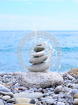 Stack of Stones Near the Beautiful Blue Ocean