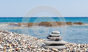 Stack of stones on a pebble beach