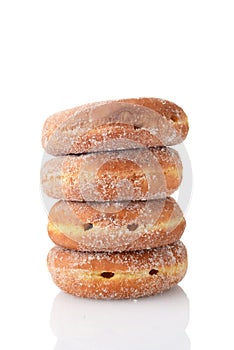 Stack of sugar paczki donuts