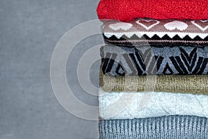 stack of sweaters, jumpers