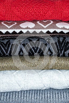 A stack of sweaters, jumpers