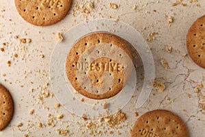 Stack of sweetmeal digestive biscuits closeup of a pile of biscuits on a texture background