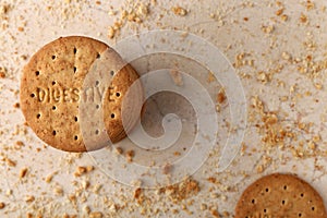 Stack of sweetmeal digestive biscuits closeup of a pile of biscuits on a texture background