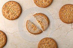 Stack of sweetmeal digestive biscuits closeup of a pile of biscuits on a texture background