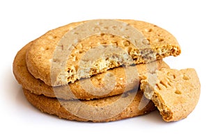 Stack of sweetmeal digestive biscuits isolated on white.