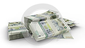 Stack of Tajikistani somoni notes isolated on white background