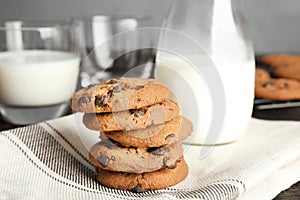 Stack of tasty chocolate chip cookies and milk