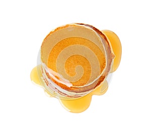 Stack of tasty pancakes with maple syrup on white background