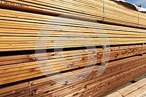 Stack of terrace boards for sale at lumber yard