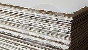 Stack of Textured Handmade Paper Sheets