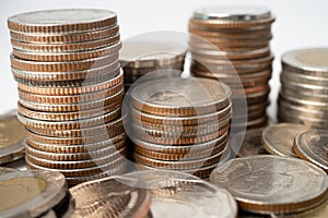 Stack of Thai baht coins on white background, Business finance investment.