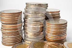 Stack of Thai baht coins on white background, Business finance investment concept