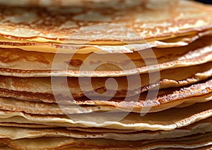 Stack of thin golden crepe pancakes for breakfast.Macro.AI Generative