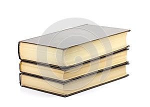 Stack of three books isolated on white