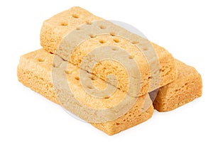 Stack of three butter shortbread finger biscuits photo