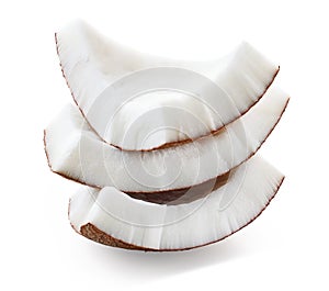 Stack of three fresh coconut pieces or slices on white background