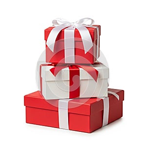 Stack of Three Red and White Gift Boxes Tied with White and Red Ribbons