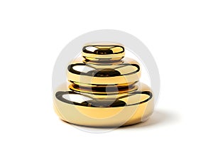 Stack of three golden circular objects