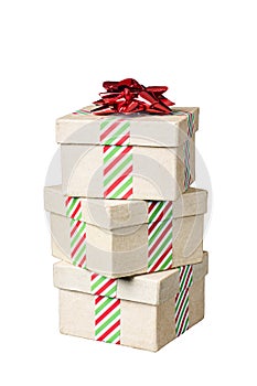 Stack of three holiday gifts isolated on white. Striped ribbon a