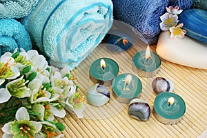 Towels, soaps, flowers, candles