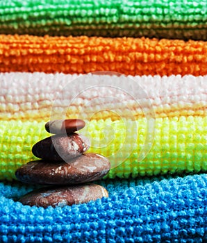 Stack of towels and stones.