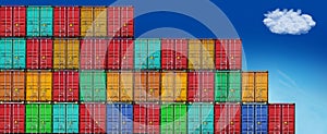Stack of transport containers and cloud in sky