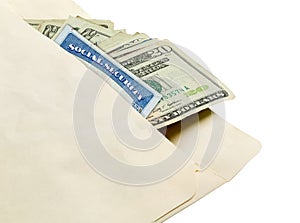 Stack of twenty dollar bills in envelope with social security card
