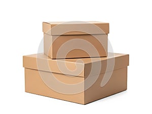 Stack of two brown cardboard boxes on white background