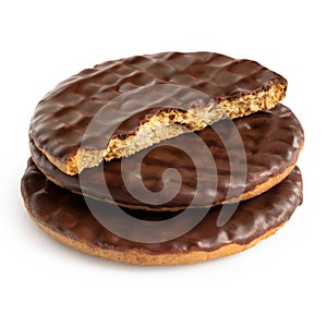 Stack of two and half dark chocolate coated digestive biscuits isolated on white