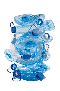 Stack of used blue plastic bottles