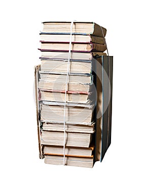 Stack of used books tied with packthread isolated