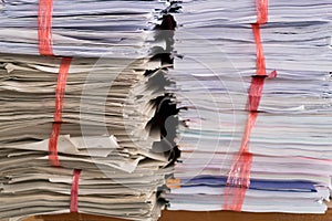 Stack of used paper and old document packed ready to be sent out for recycle