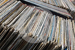 Stack of used vinyl records in covers put on sale