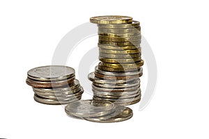 Stack of various coins close-up isolated on a white background. Image of metal coins for project and design. Concept