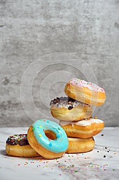 a stack of various donuts