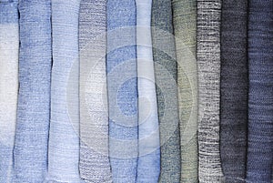 Stack of various jeans