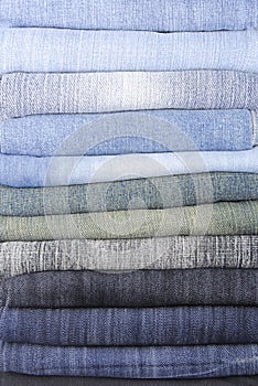 Stack of various jeans