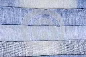 Stack of various jeans