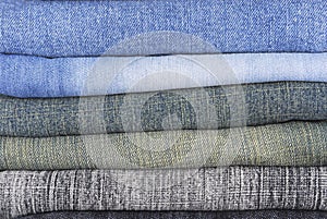 Stack of various jeans