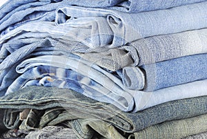 Stack of various jeans