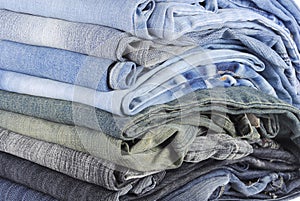 Stack of various jeans