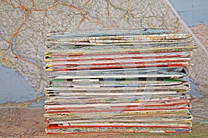 Stack of various travel maps photo