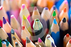 Stack of various vibrant color pencils as creativity, imagination, possibility, education, creative school concept background