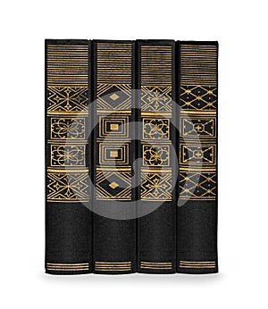 Stack of vintage books black with gold pattern