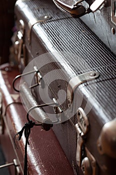 Stack of vintage retro suitcases closeup